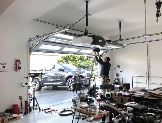 Westmont Garage Door Repair specialist installing smart garage door opener system in Westmont home