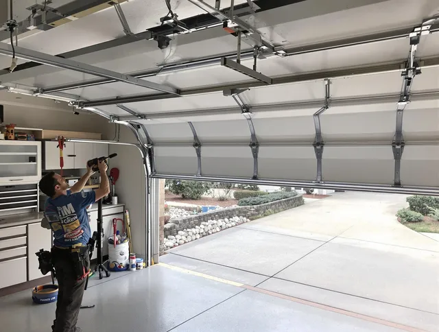 Garage door track repair service by Westmont Garage Door Repair in Westmont